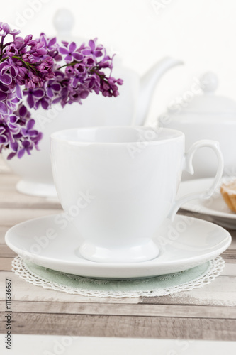 Composition of white porcelain cup