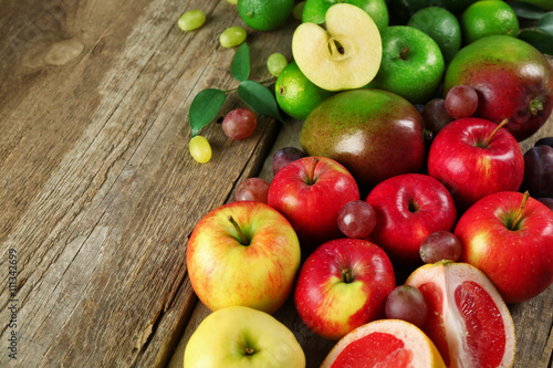 Fruits on wooden background