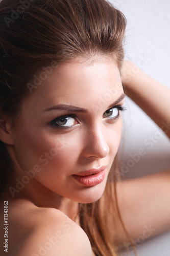 Close up portrait of beautiful young woman face. 