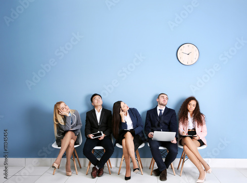 Young people sitting on a c...