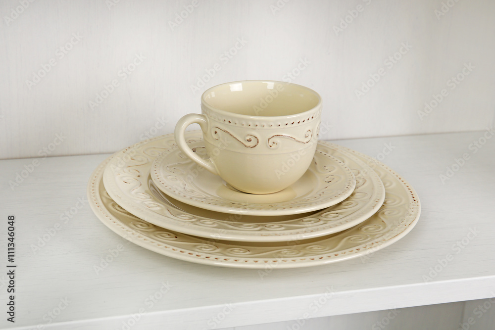 Dishes in cupboard in the kitchen Dishes in cupboard in the kitchen