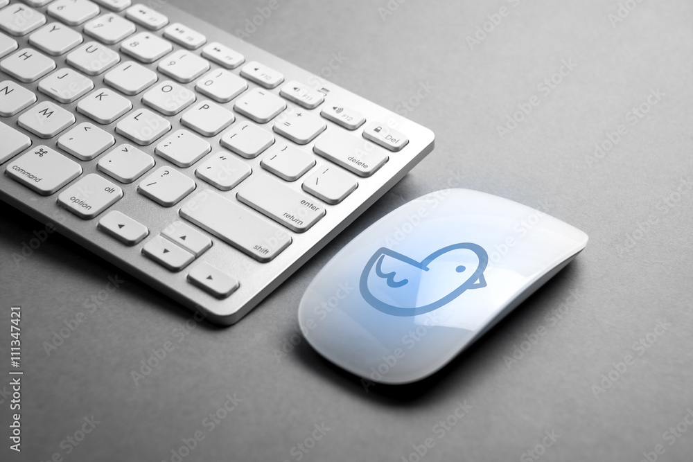 Social media icon on mouse & computer keyboard Social media icon on mouse & computer keyboard