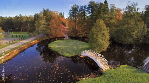 Trees surrounding the lake in a manor in Lihula Estonia one of the many parts of the Lahemaa Park photo