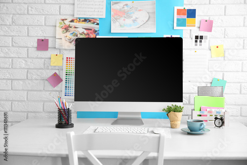 Stylish bright workplace of...