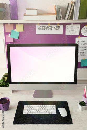 Stylish workplace with comp...