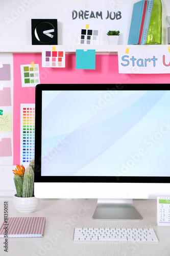 Stylish workplace with comp...