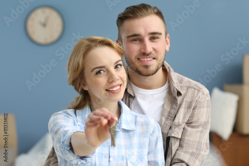Young happy couple holding ...