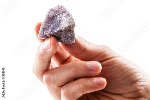фотографія Holding a lepidolite piece