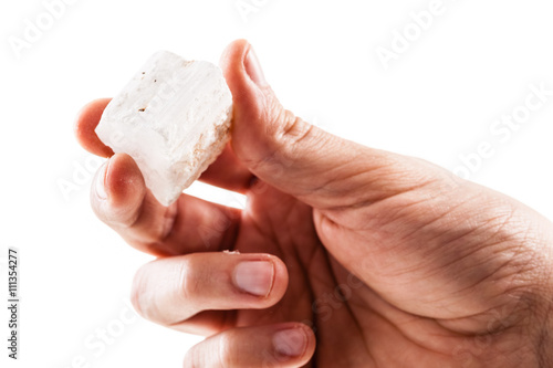 Holding a selenite stone photo