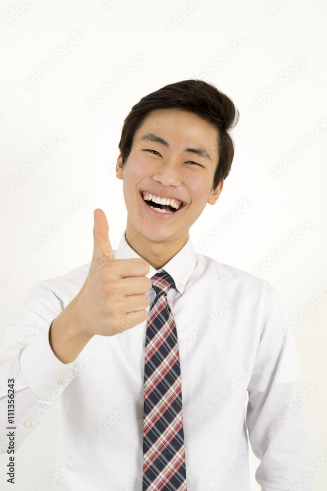 Success businessman thumb up