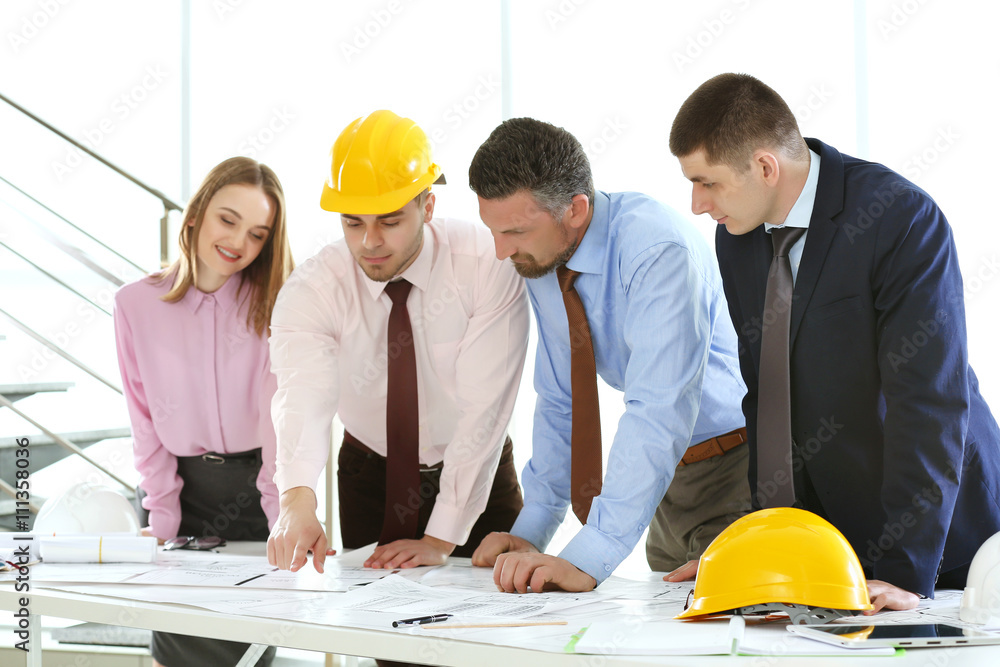 Young engineers working in the office Young engineers working in the office