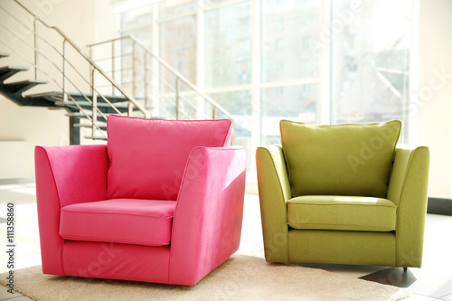 Two comfortable armchairs i...
