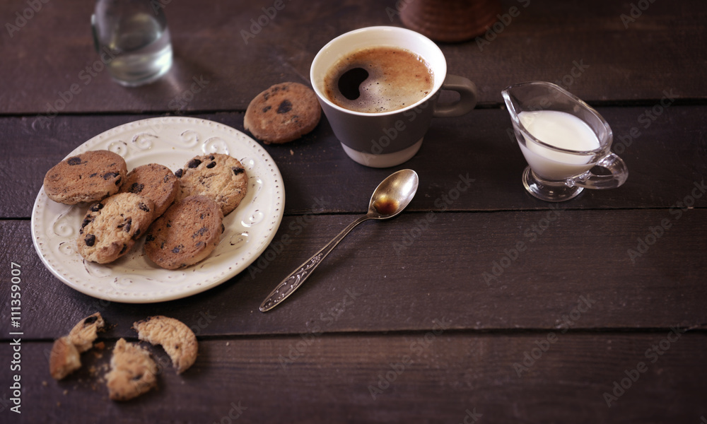 Cup of coffee with cookies on wooden table Cup of coffee with cookies on wooden table