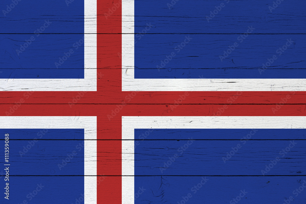 Fototapeta premium Flag of Iceland on wooden background
