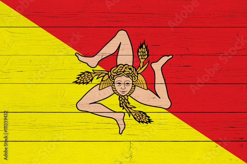 Flag of Sicily on wooden background