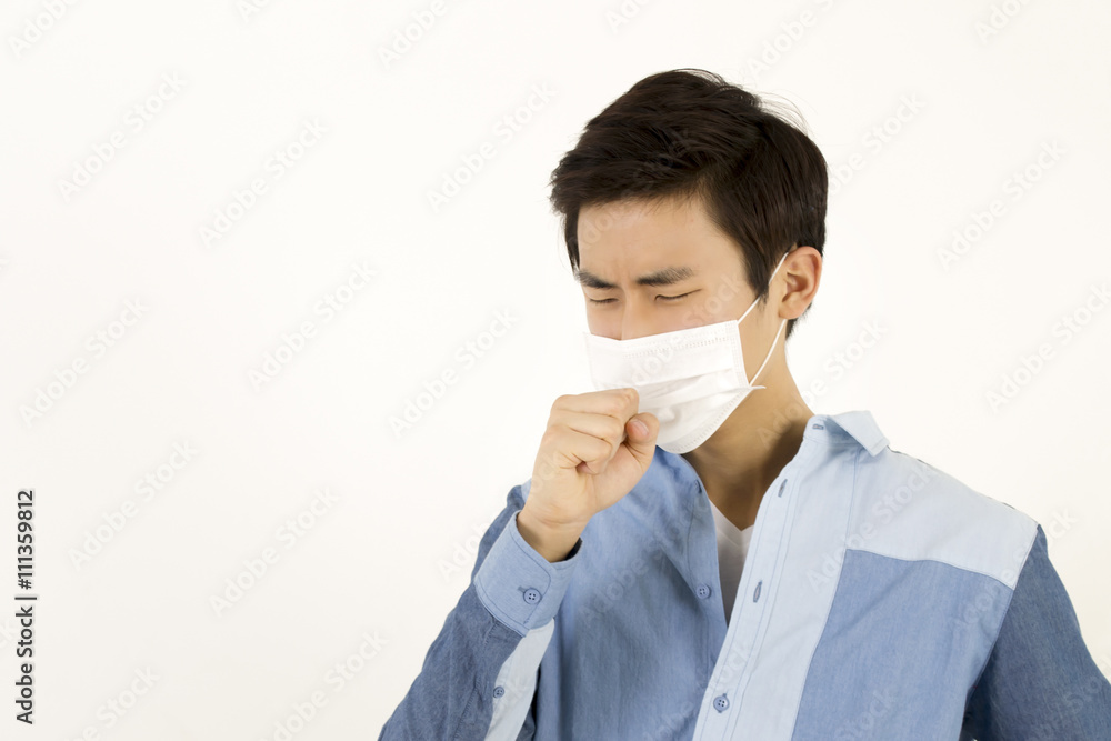 Asian man wearing a face mask with coughing Asian man wearing a face mask with coughing