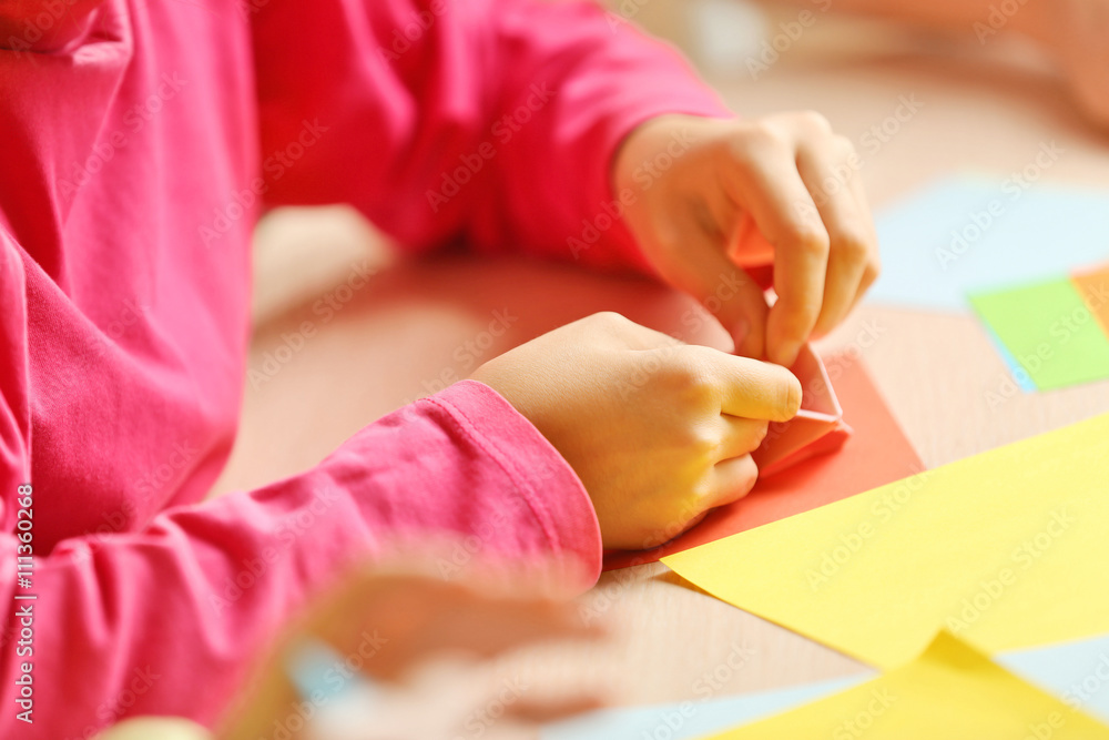 Children making swan with coloured paper Children making swan with coloured paper