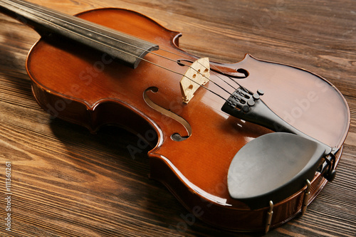 Violin on wooden background