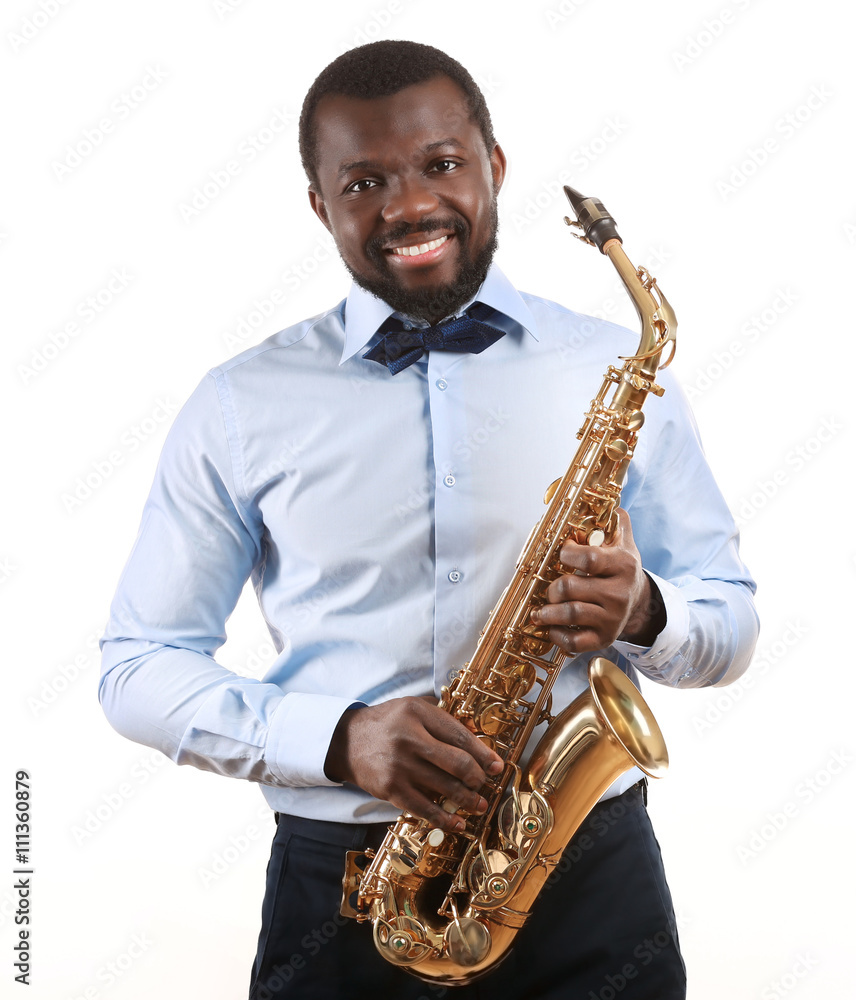 Fototapeta premium African American jazz musician playing the saxophone, isolated on white