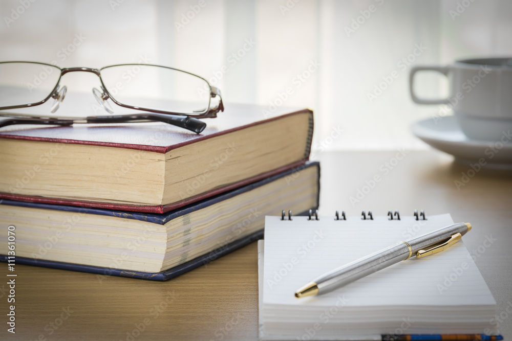 Pen put on notepad open blank page Pen put on notepad open blank page
