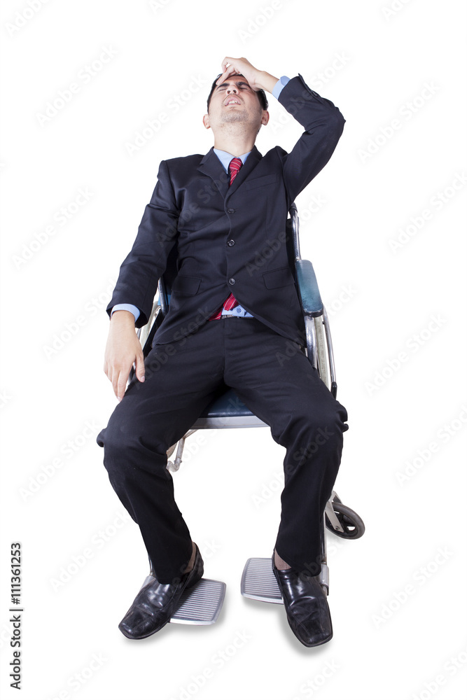Handicapped businessman looks dizzy Handicapped businessman looks dizzy