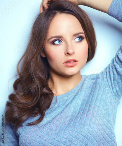 Portrait of an attractive fashionable young brunette woman