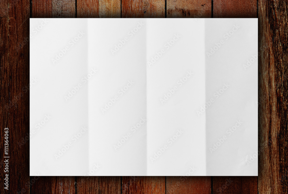 White blank paper on wood White blank paper on wood