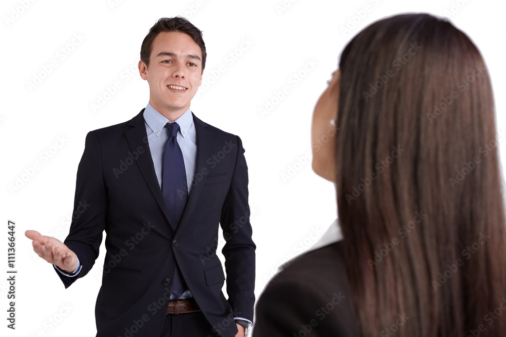 Young Caucasian business man smiling happily to a business woman Young Caucasian business man smiling happily to a business woman