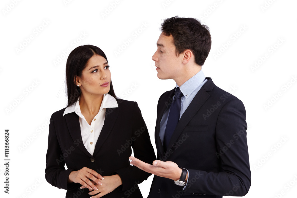 Young Caucasian business man talking to a business woman disappr Young Caucasian business man talking to a business woman disappr