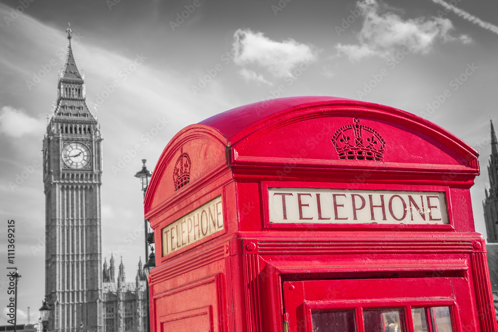 London, England - Classic British red telephone box with Big Ben on a sunny day -black and white version - UK