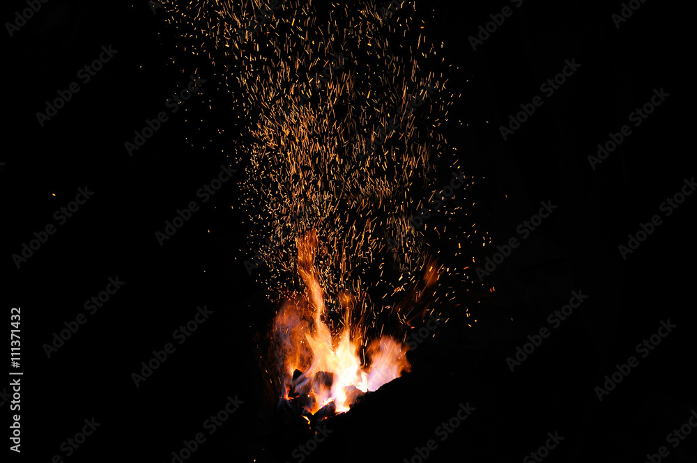 Sparks from the fire in the forge