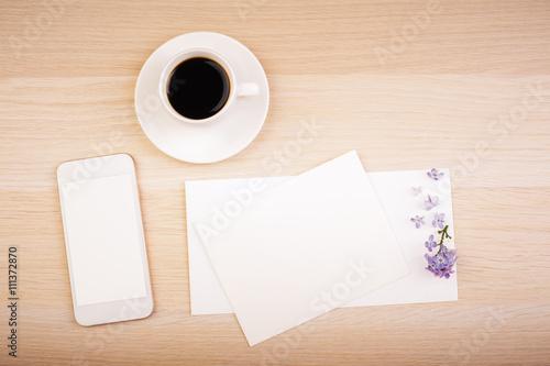 Phone, coffee and blank cards