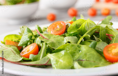 Close up plate of fresh salad