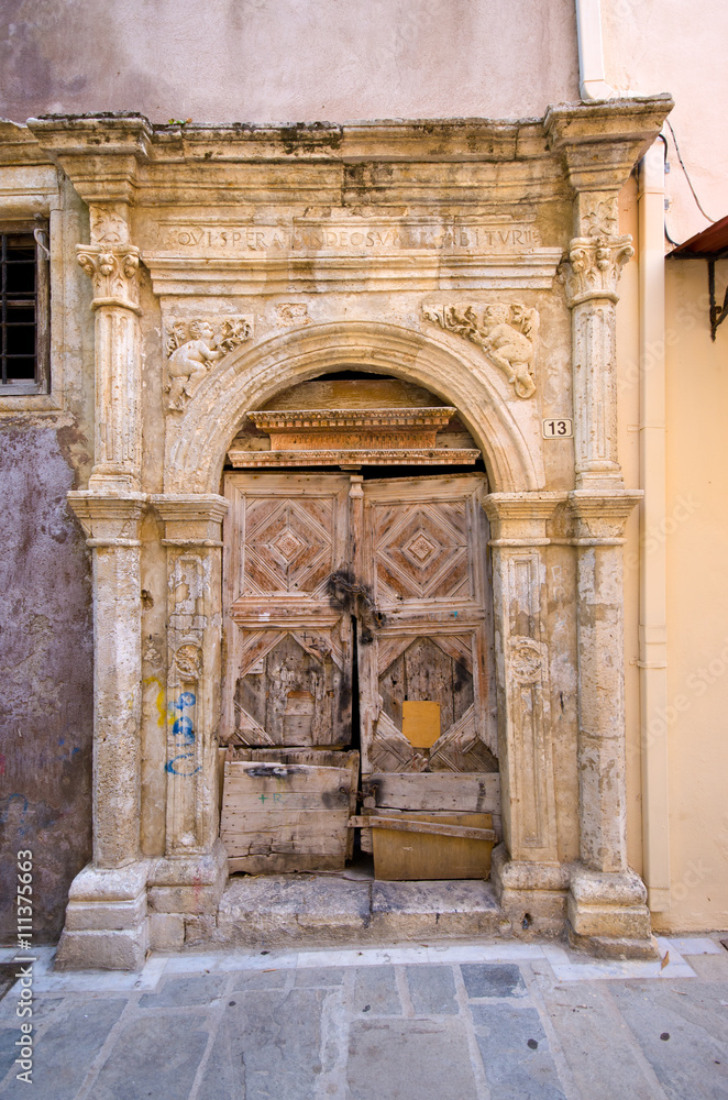 Old door in the ancient wall