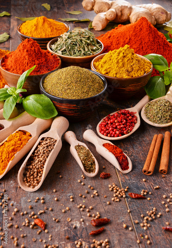 Fototapeta Naklejka Na Ścianę i Meble -  Variety of spices on kitchen table