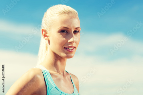 happy young sporty woman outside