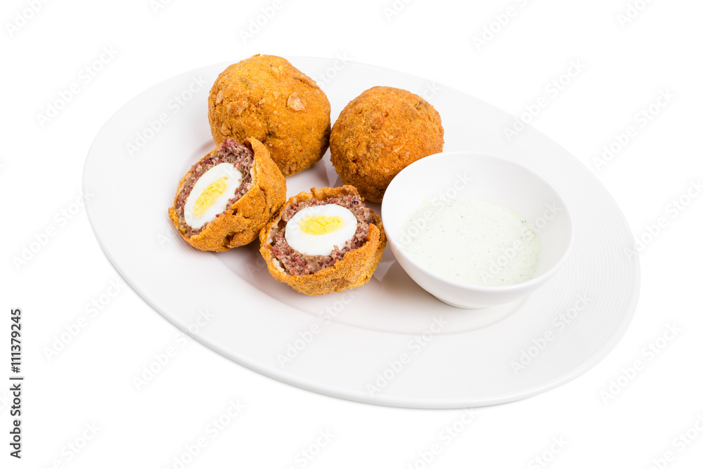 Baked scotch eggs with tartar sauce. Baked scotch eggs with tartar sauce.