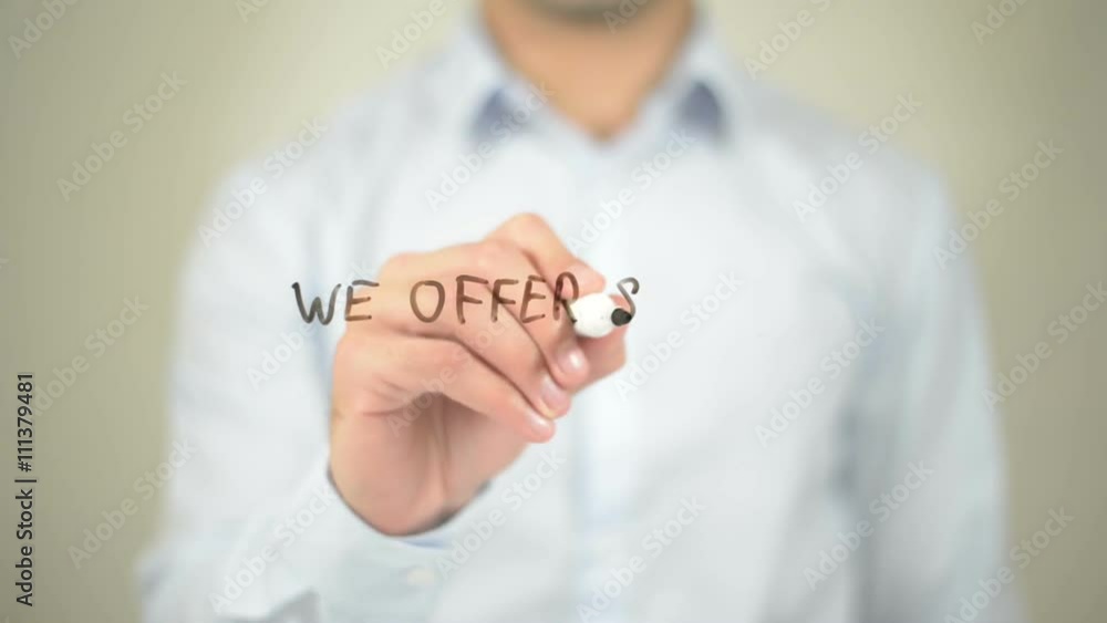 We Offer Solutions, Man writing on transparent screen We Offer Solutions, Man writing on transparent screen