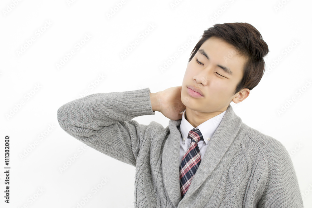 Man with neck and shoulder pain, after long hours of work studying Man with neck and shoulder pain, after long hours of work studying