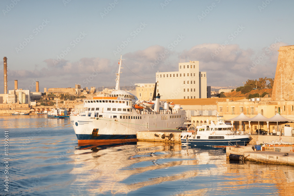 Sunny morning view of Valletta port.