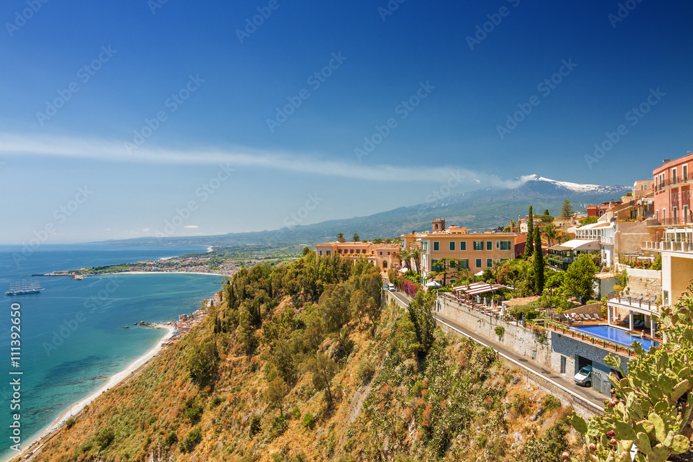 Beautiful sunny view from Taormina viewpoint at Etna.