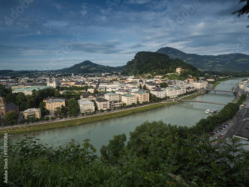 A view of the houses standing round the floating river Salzach in Salzburg, 2015