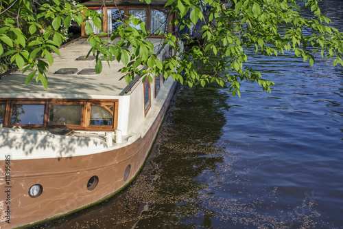 Canvas Print Modern brown boat on the river