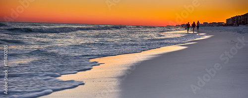 Obraz na plátně orange sunset over gulf of mexico at destin fl