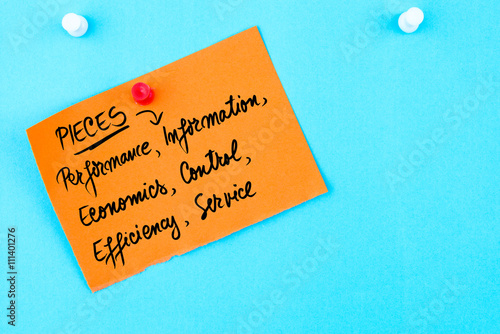 Business Acronym PIECES written on orange paper note