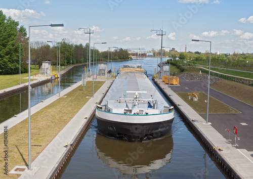 a cargo ship when entering a sluice photo