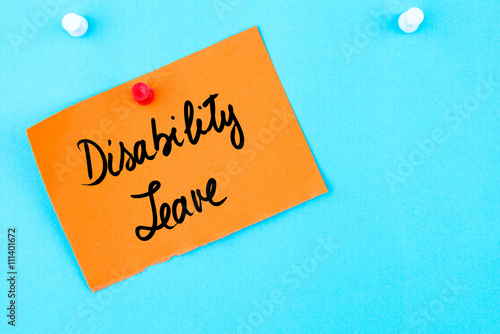 Disability Leave written on orange paper note