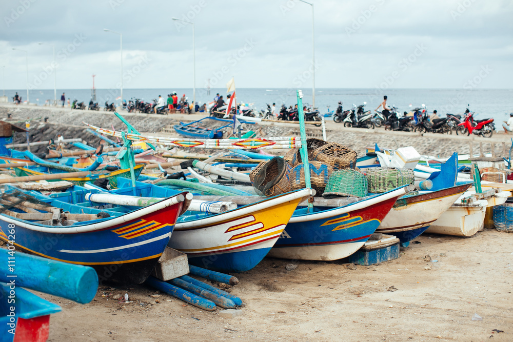 Colorful fishing boats anchored at a Beach in Bali Island, Indon