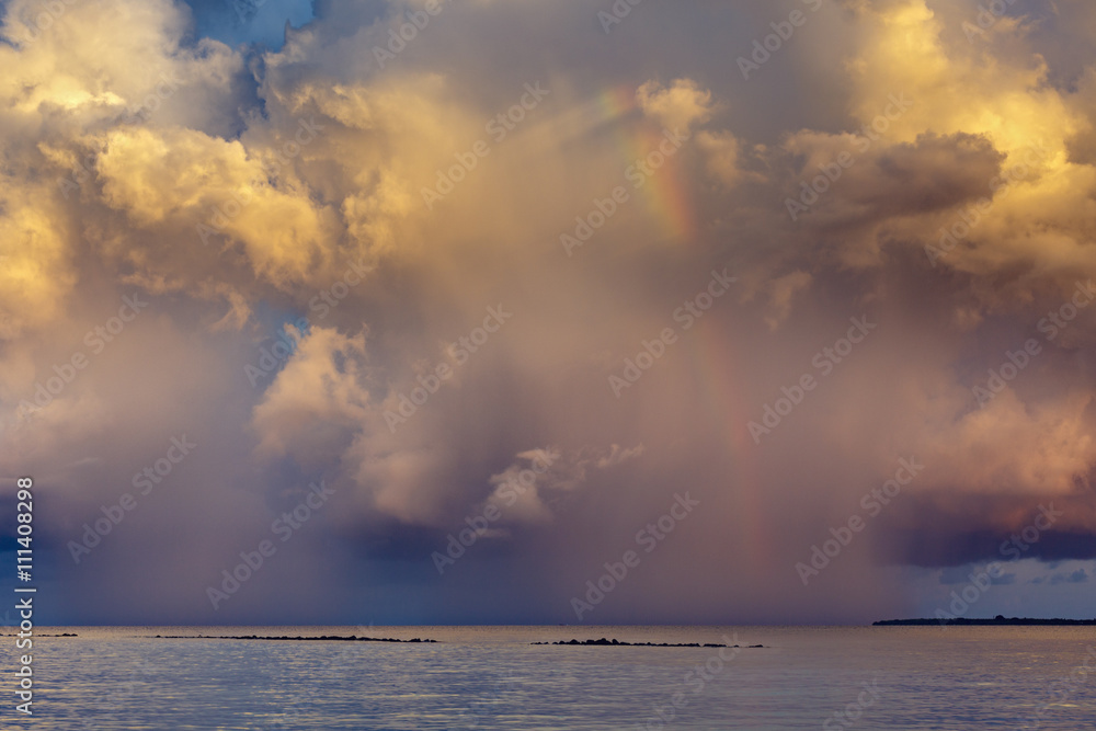 rainbow beautiful seaside at the time of sunset, storm clouds rainbow beautiful seaside at the time of sunset, storm clouds