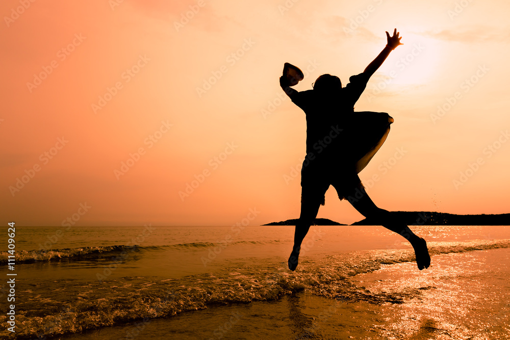 Happy young woman jumping on beach, Relaxing woman jump on the b